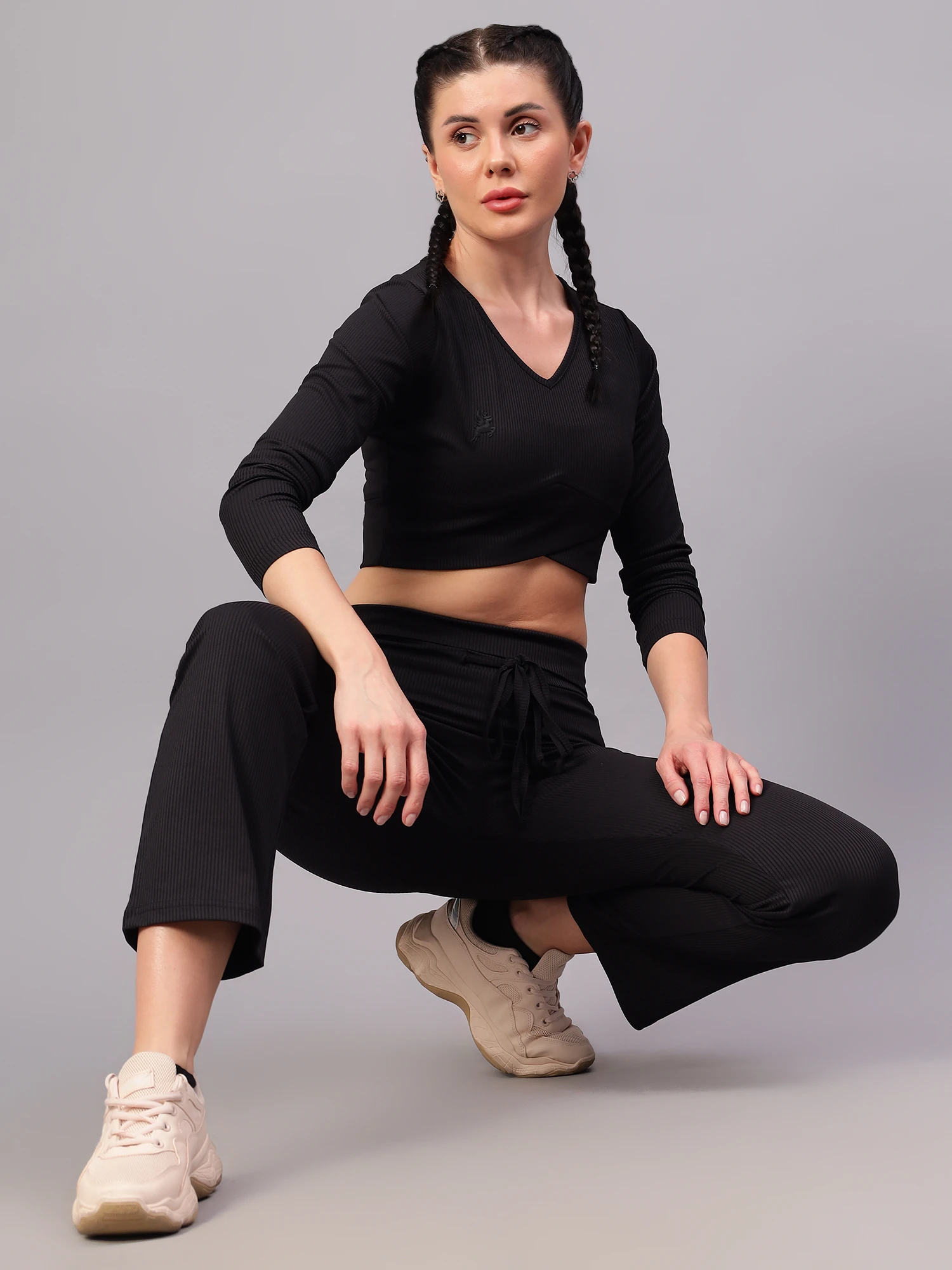 Black Ribbed Crop Top with Full Sleeves for Women by Shivnaresh