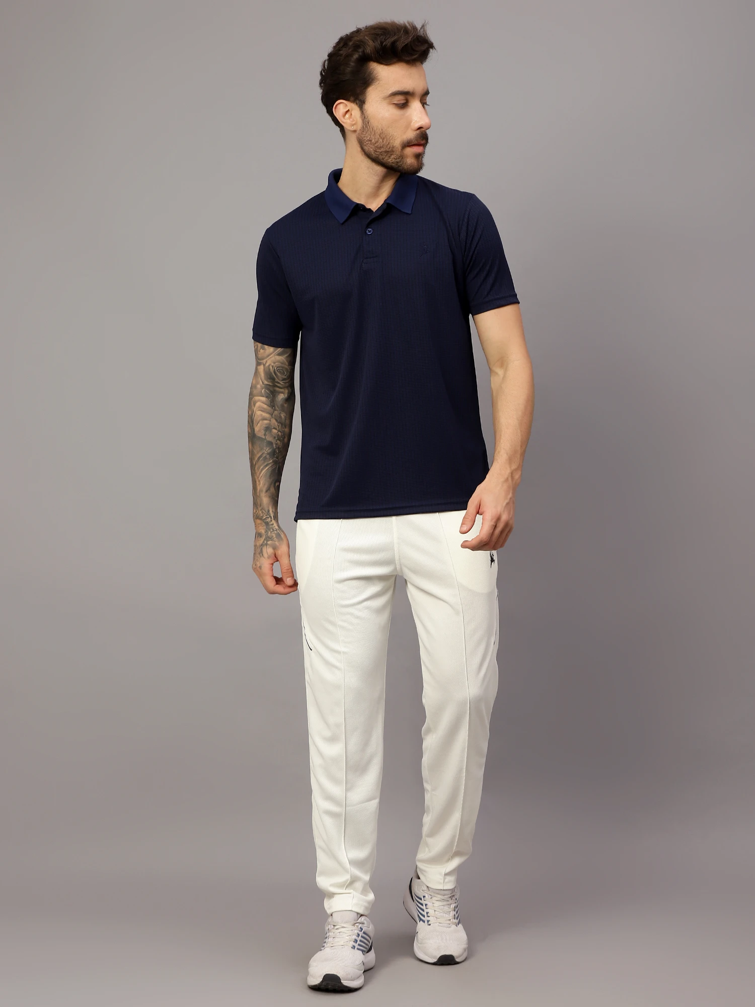 Textured Navy blue polo t shirt by Shiv Naresh