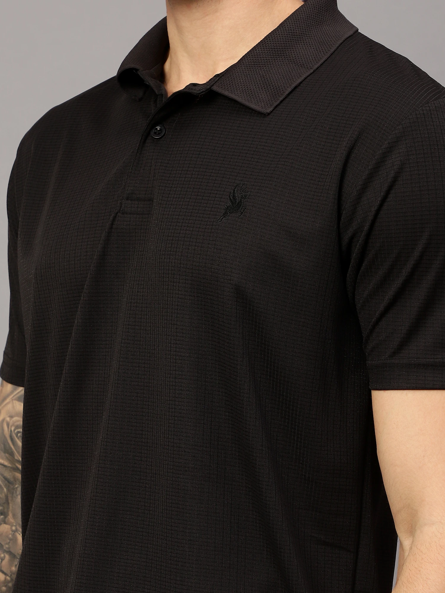 textured Black polo t shirt by Shiv Naresh