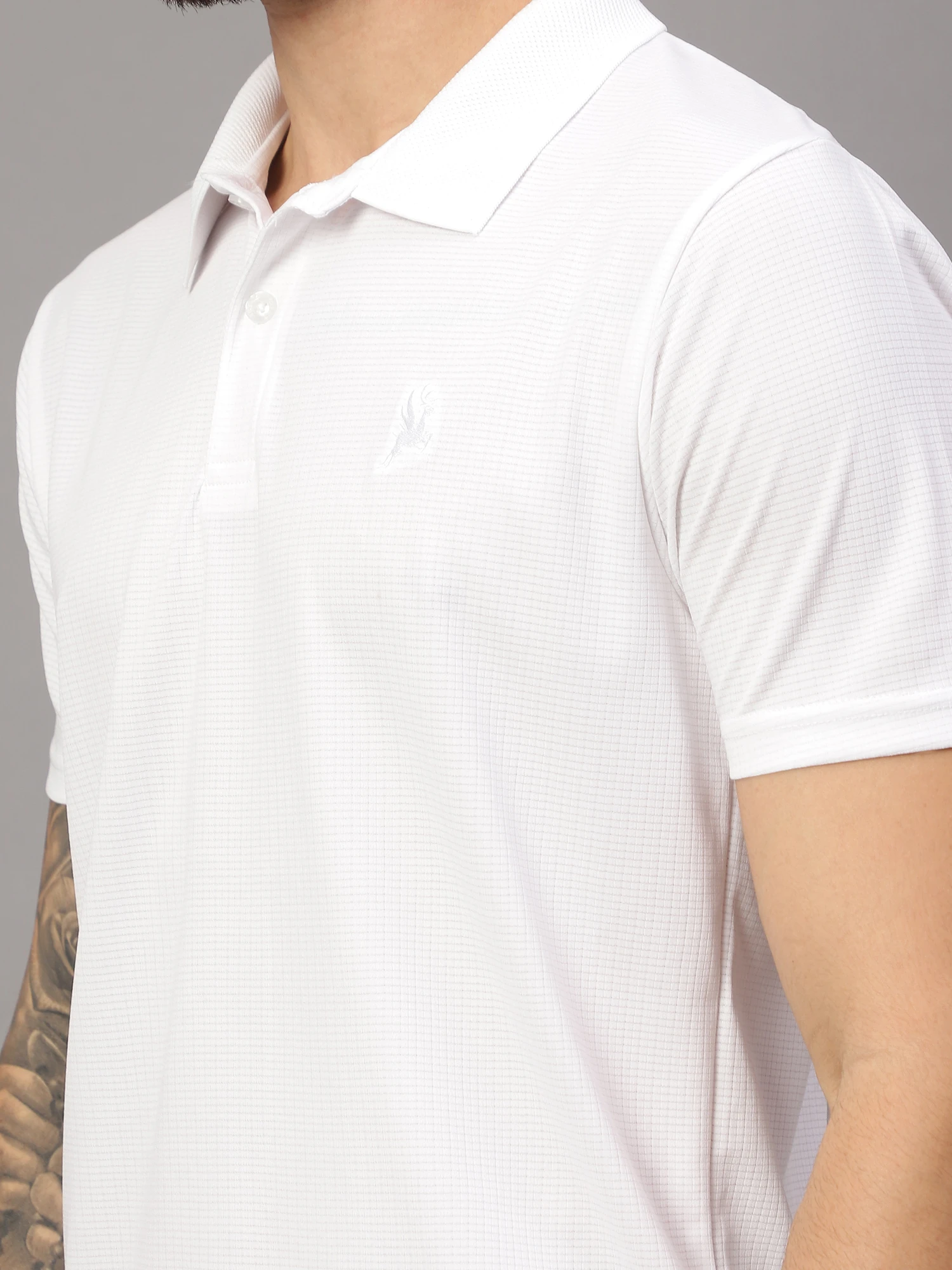 textured White polo t shirt for men by Shiv Naresh