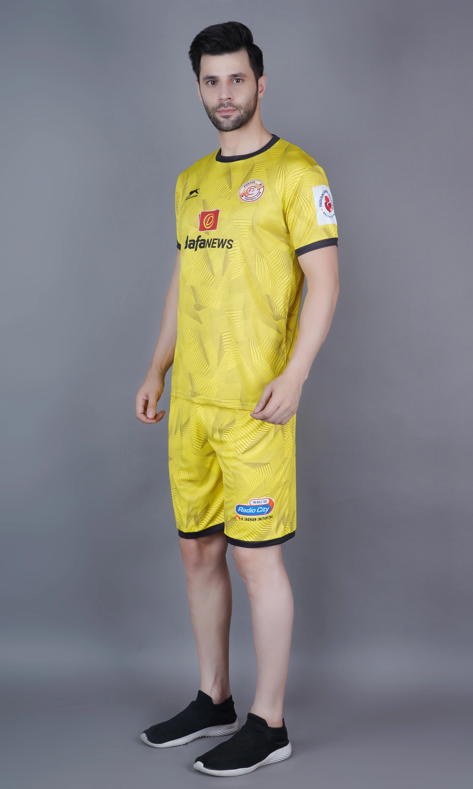 Shiv Naresh Punjab Football Club kit in Lemon