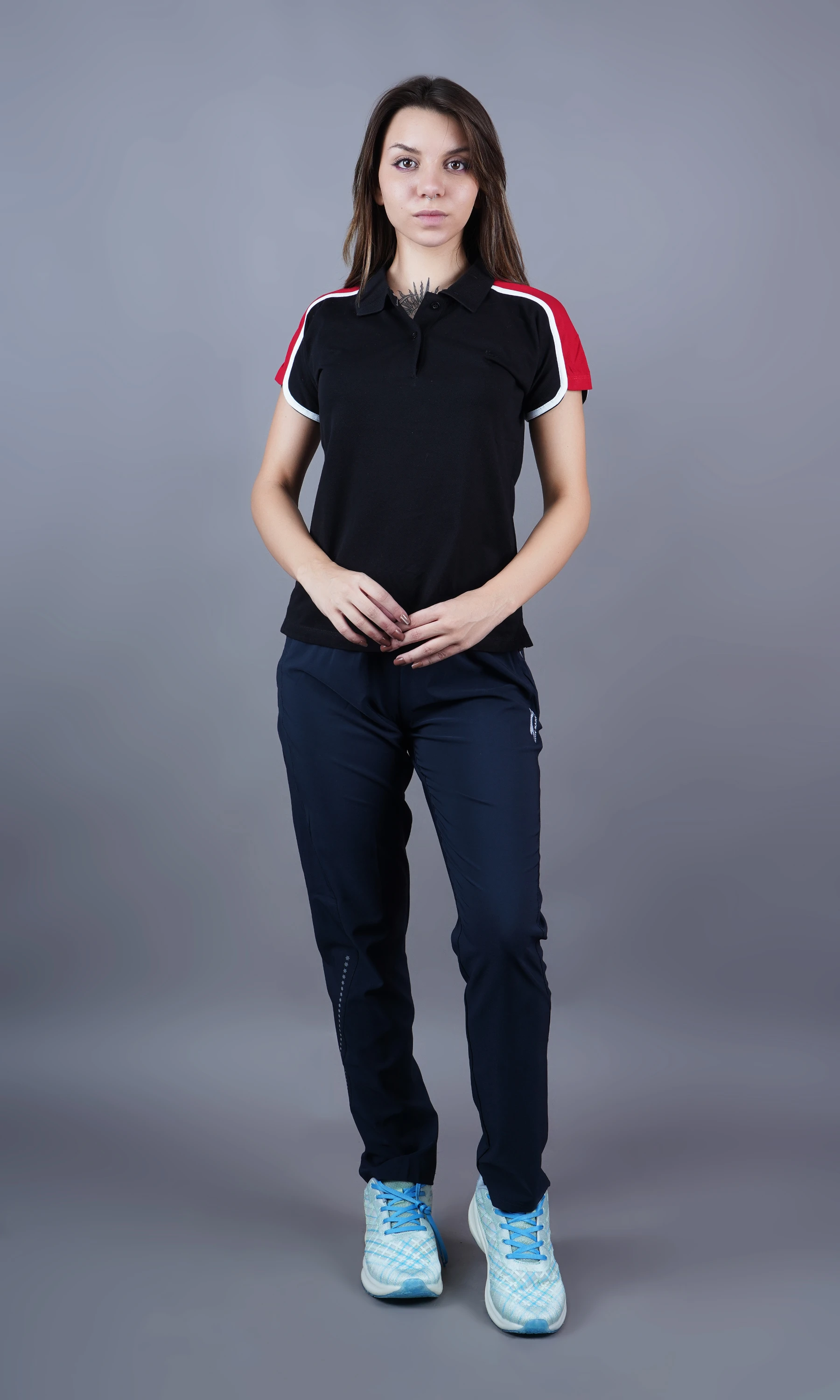 Black solid polo t-shirt for women by Shiv Naresh