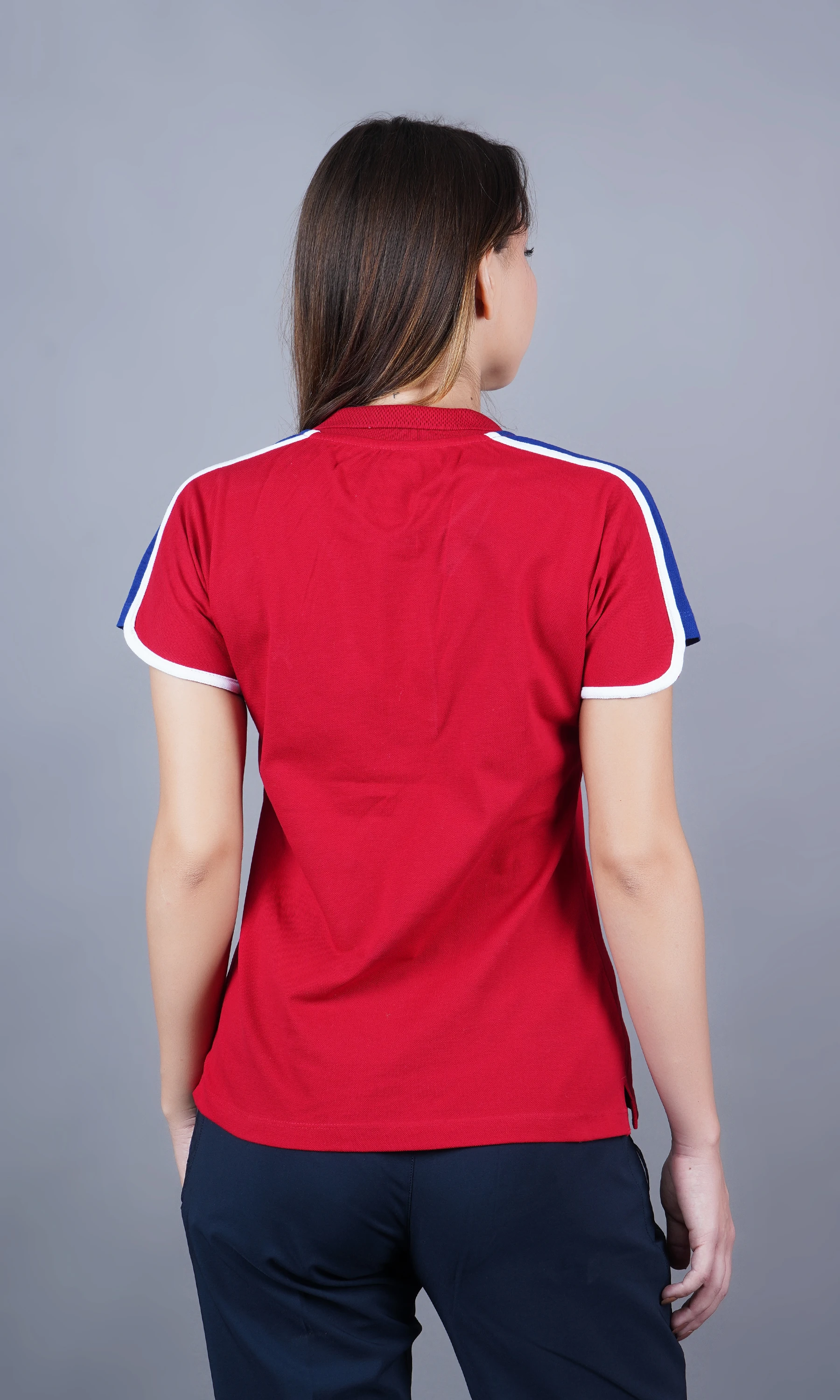 Red solid polo t-shirt for women by Shiv Naresh