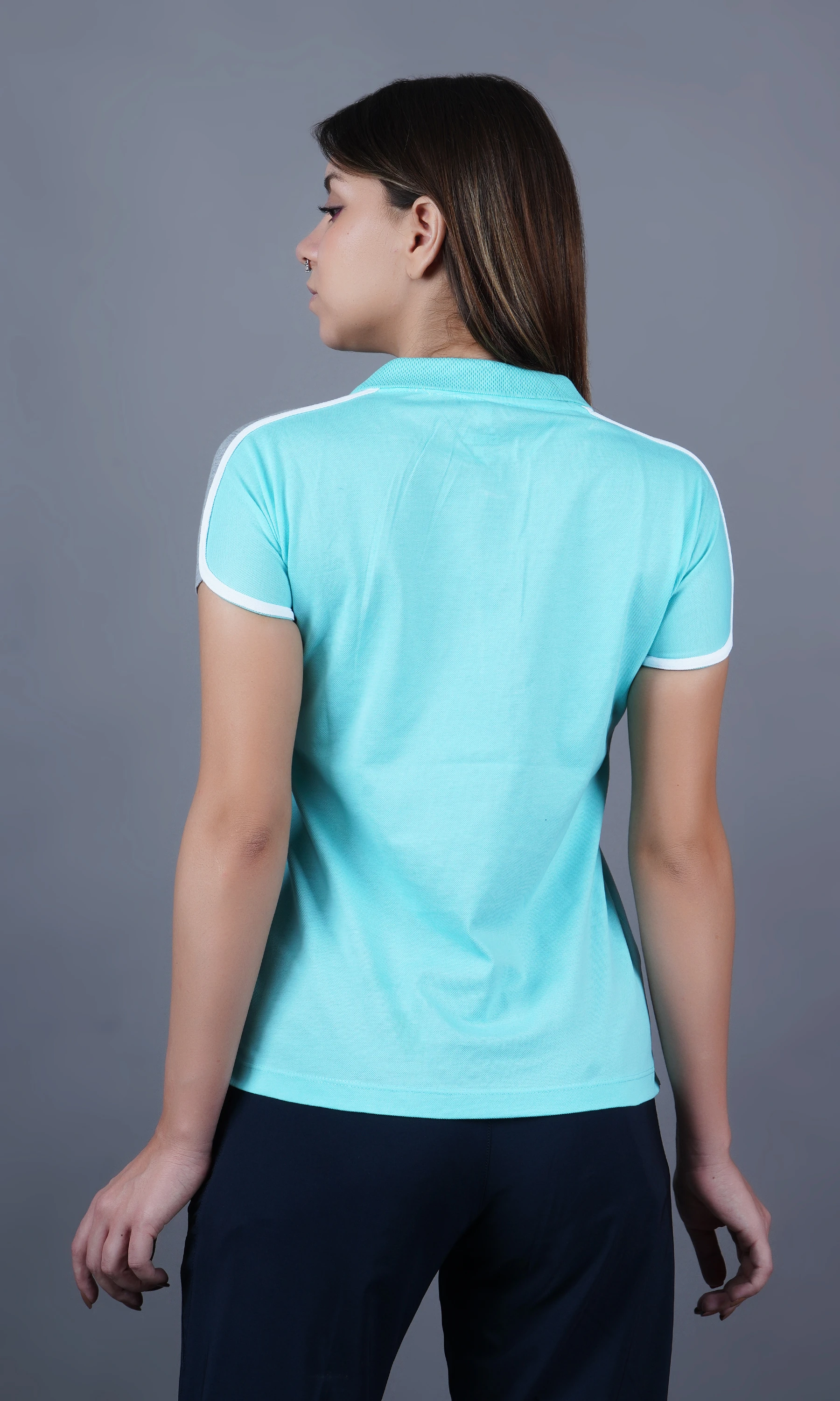 Mint solid polo t-shirt for women by Shiv Naresh