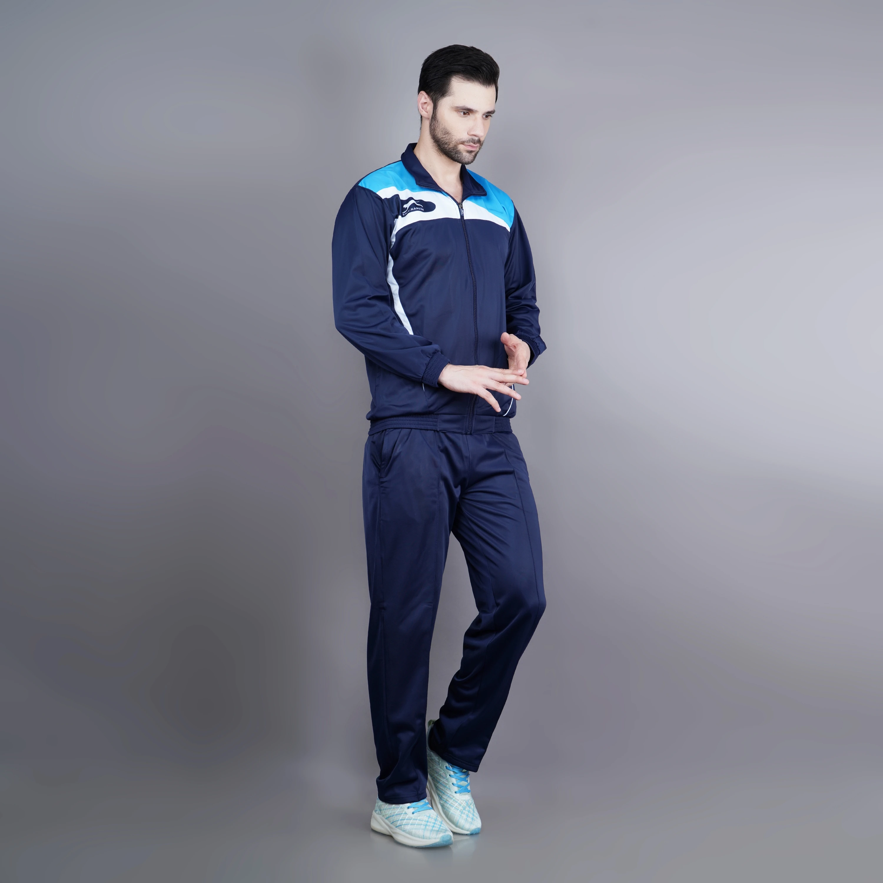 Men's navy, cyan, and white athletic tracksuit
